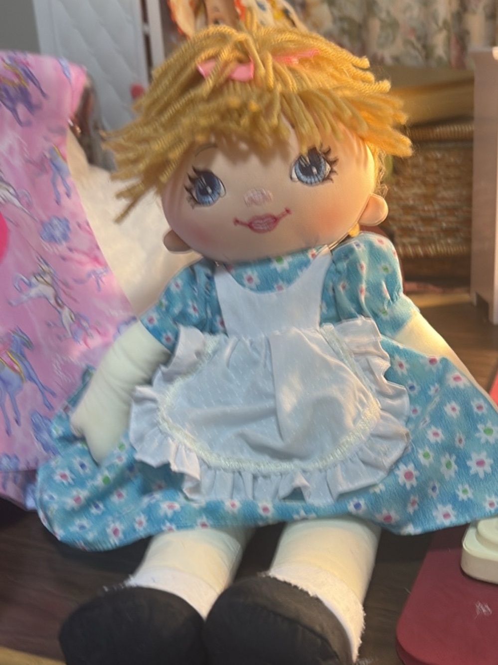 Vintage Blue Floral Rag Doll with White Apron and Yellow Yarn Hair